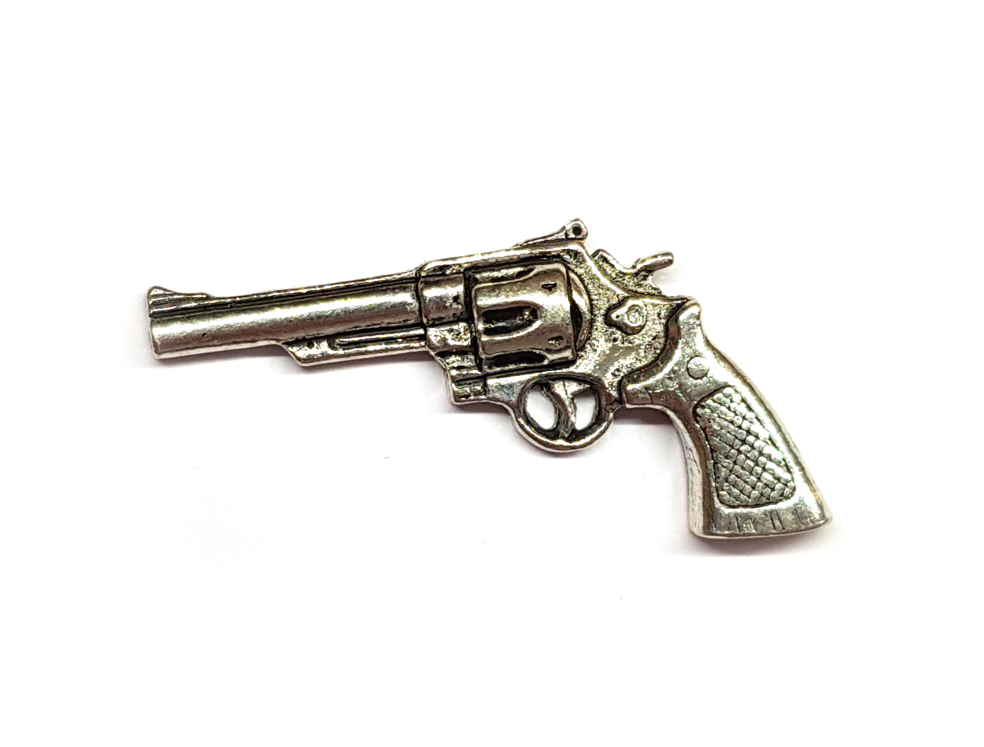 Odznak revolver 2