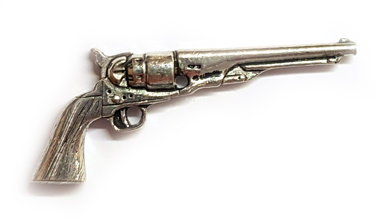 Odznak revolver